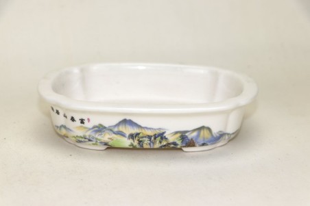 Maceta para bonsai cerámica esmaltada  con dibujo de paisaje en varios colores.